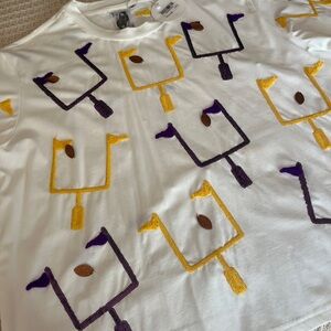 Queen of Sparkles White Embroidered Goalpost Tee with Purple & Gold Motif